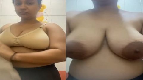 Tanker maal stripping bra and showing huge boobs