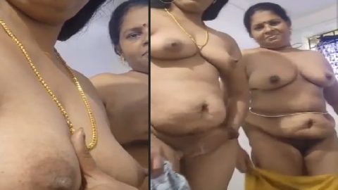 Two mature MILF standing naked on a video call